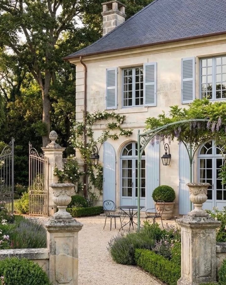 French Countryside Entry with Blue Doors and Shutters