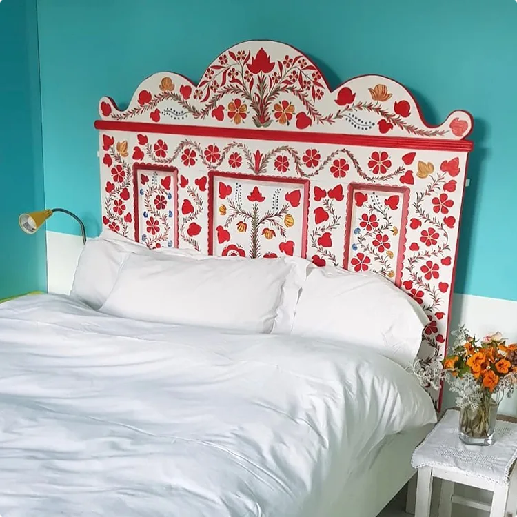 White Folk Floral Headboard with Teal Wall