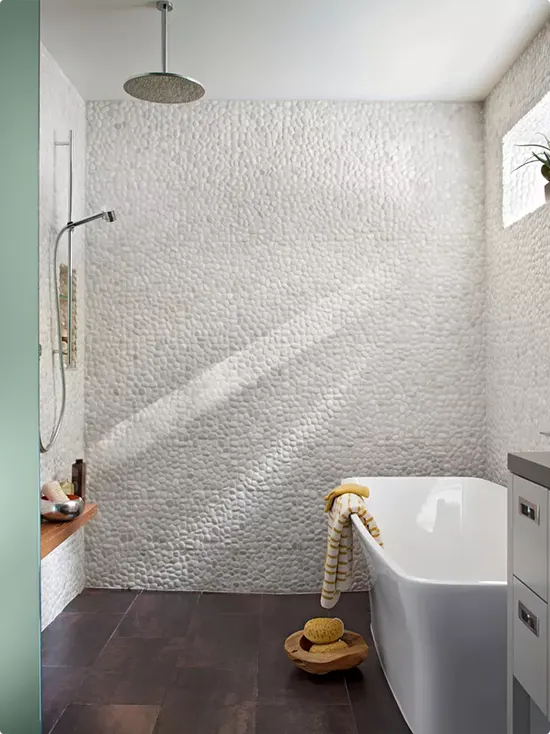 White Pebble Tile Freestanding Tub