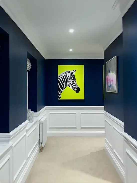 Navy Blue Hallway with White Wainscoting