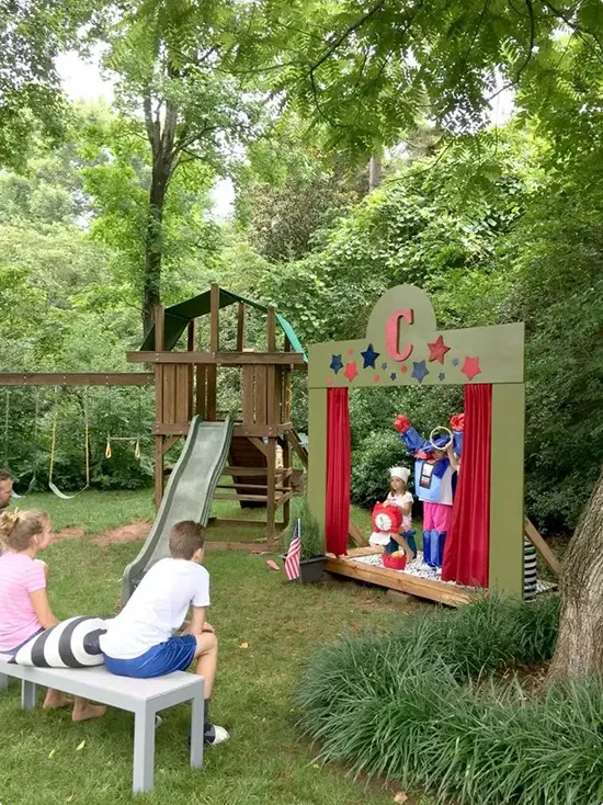 Painted Wooden Backyard Stage with Red Star Curtains