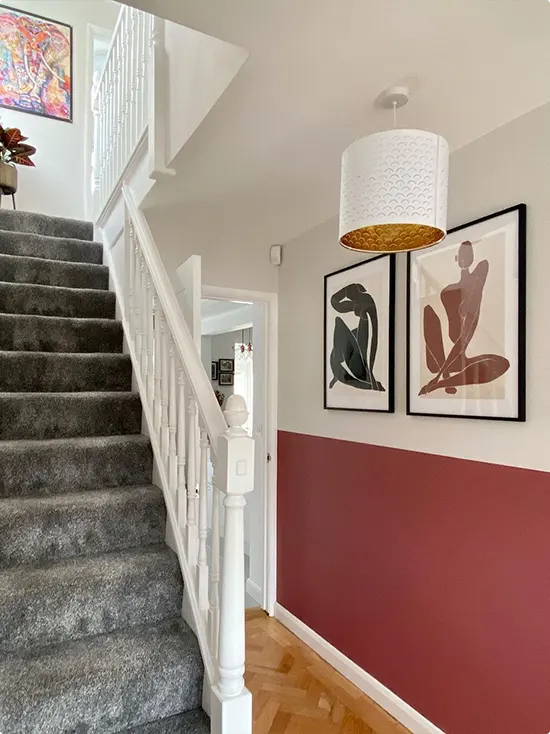 Staircase Hallway with a Crimson Red Lower Wall