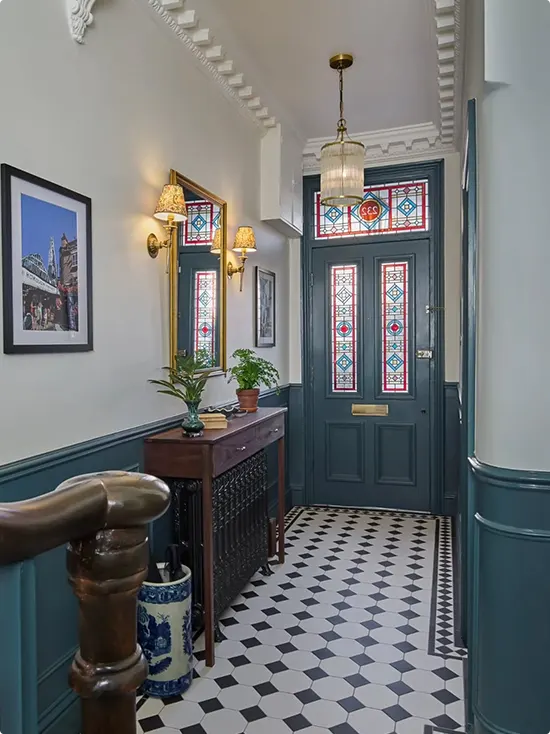 Victorian Hallway with White and Teal Wainscoting
