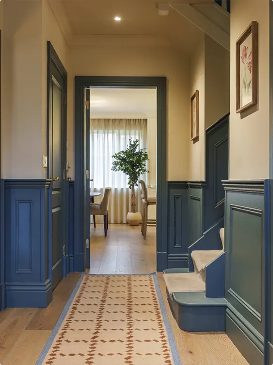 Warm Beige Hallway with Deep Blue and Blue-Green Wainscoting