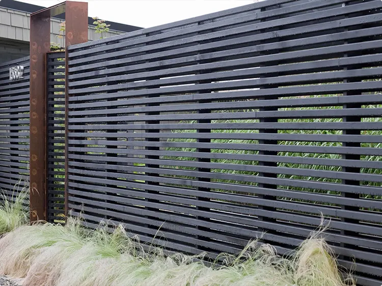Black Horizontal Wood Fence with Weathered Steel Posts