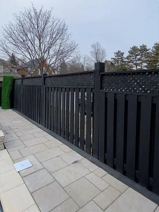 Matte Black Fence with Vertical Slats and Diamond Lattice