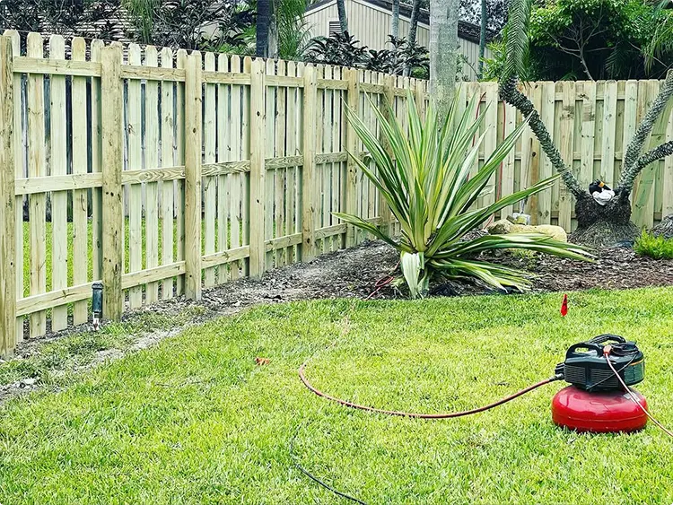 Pressure-Treated Shadowbox Fence for a Yucca Garden