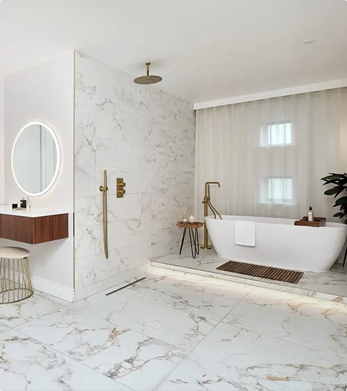 White Marble Shower with Gold Fixture and Gray Veining