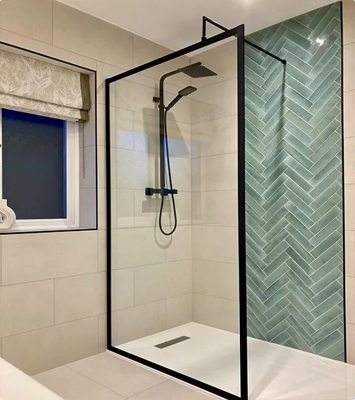 White Subway Tile With a Sage Herringbone Accent