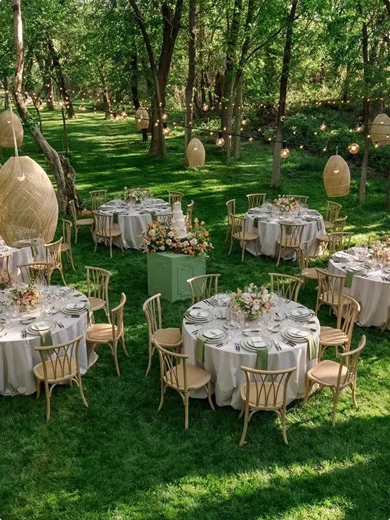 Woodland Reception with Rattan Pendants and Globe Lights