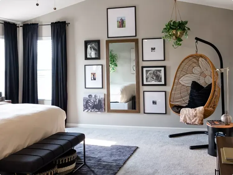 Black and White Photo Gallery with a Large Wood Mirror