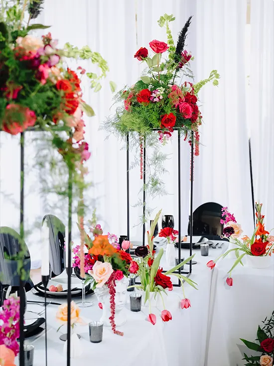 Black Floral Centerpiece with White Table Setting