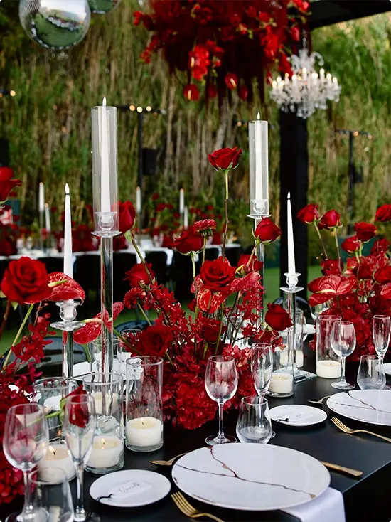 Marble Table Setting with Red Flowers