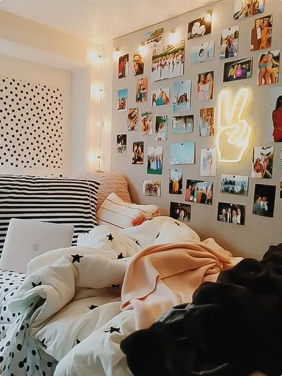 Photos and Fairy Lights with a Peace Neon Sign