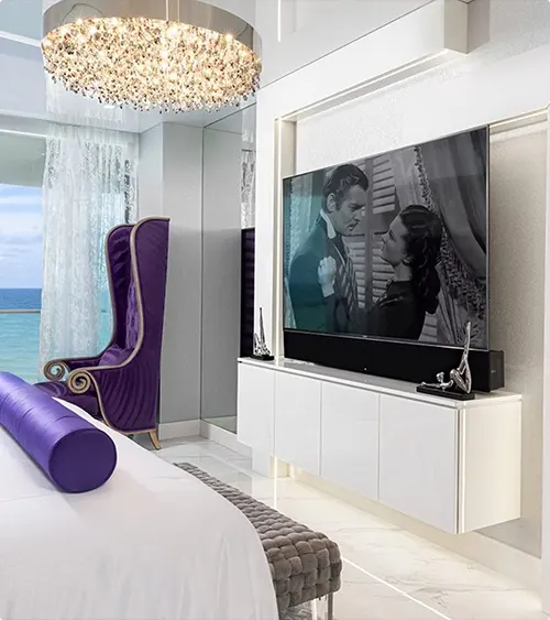 TV Wall with Mirrored Panels and Ocean View