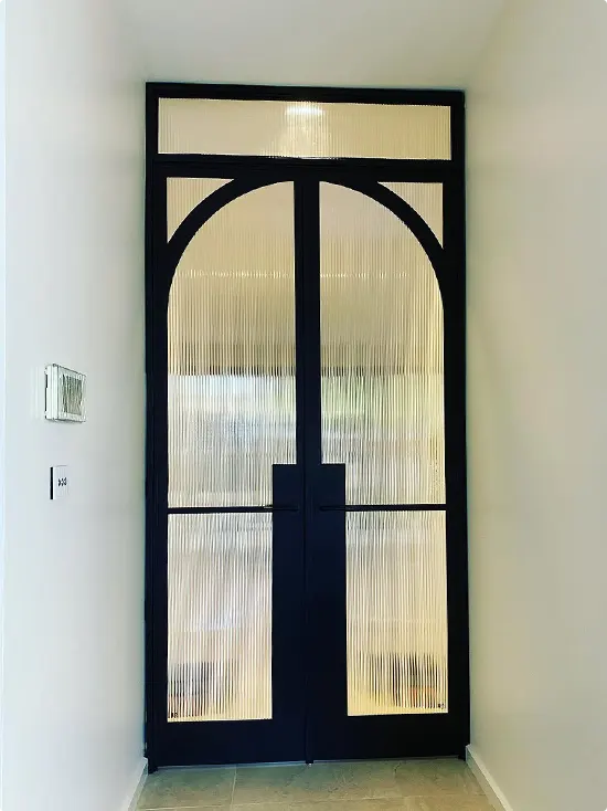 Arched French Door with Reeded Glass