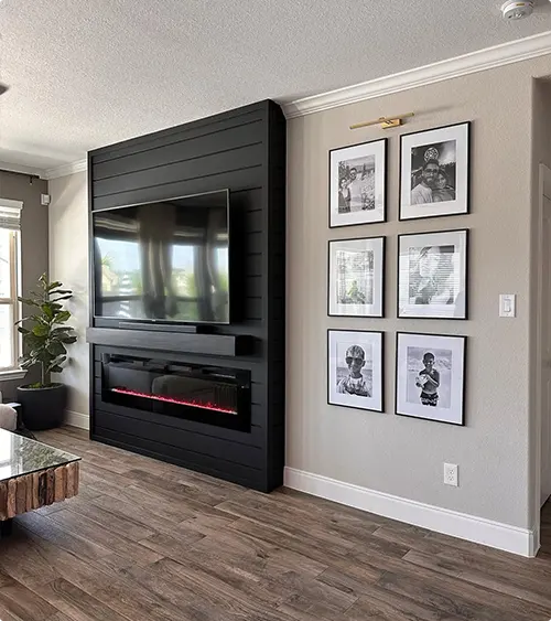 Black Horizontal Panel Fireplace with Family Photos