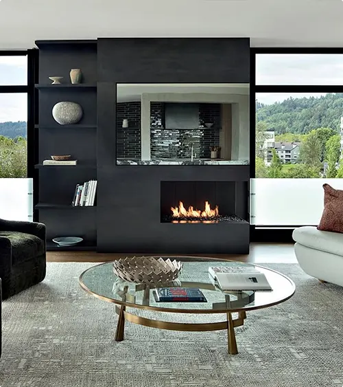 Freestanding black fireplace wall in a modern style