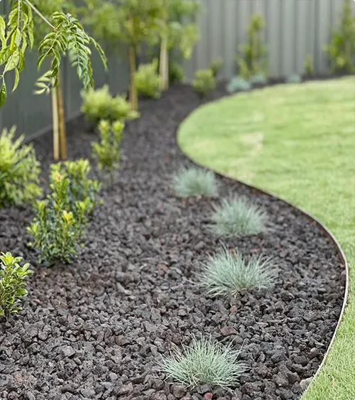 Sweeping Curved Border with Silver-Blue Ornamental Grass