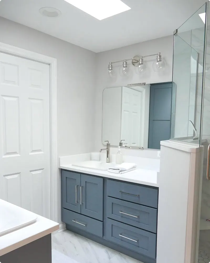 Chrome Accent Hardware on a Dusty Blue Vanity