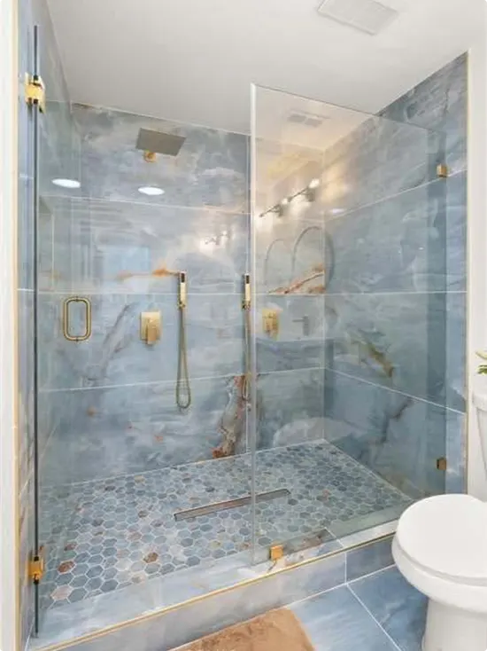 Generous Walk-In Shower with Blue-Gray Hexagon Floor