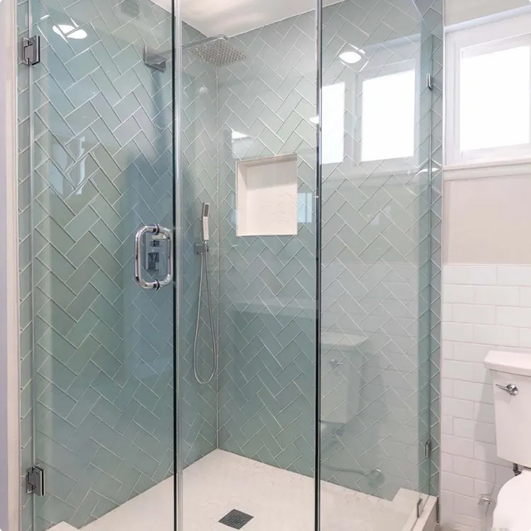 Glass-Enclosed Sage-Blue Herringbone Shower