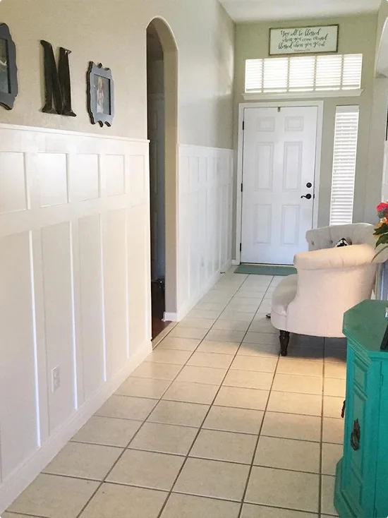 Teal Side Cabinet in a Wide White Board and Batten Entryway