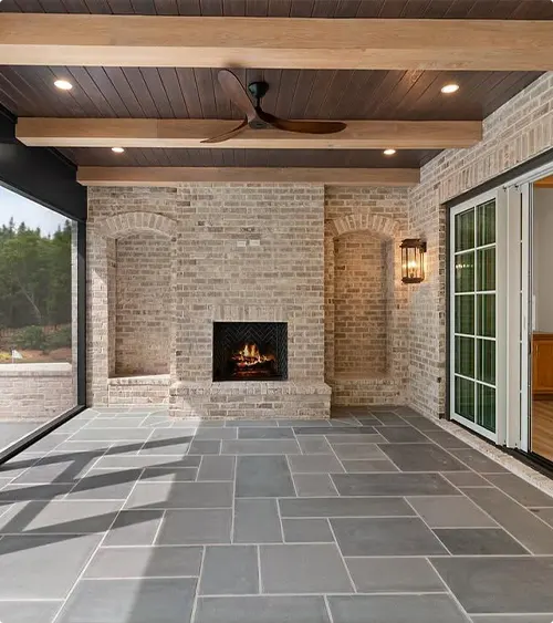 Arched Brick Covered Patio Fireplace