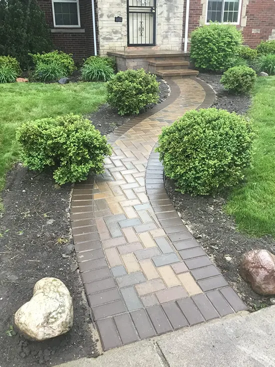 Curved Herringbone Brick Path