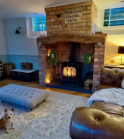 Fireplace with a Brick Inscription