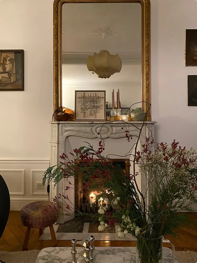 Holiday Greenery on a Parisian Fireplace