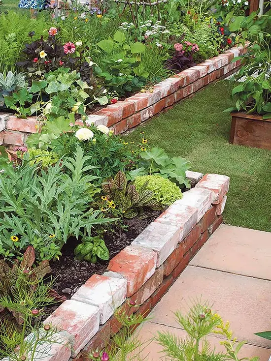 Raised Backyard Beds with Weathered Red Brick Edging