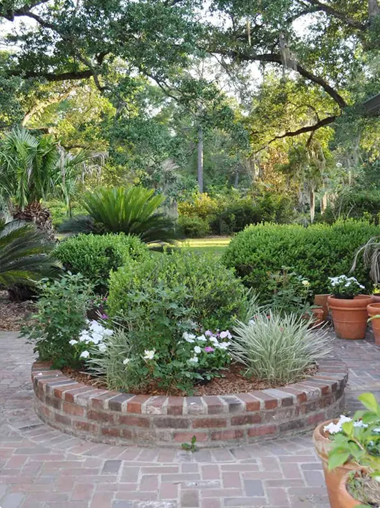 Semicircular Raised Bed on a Brick Patio