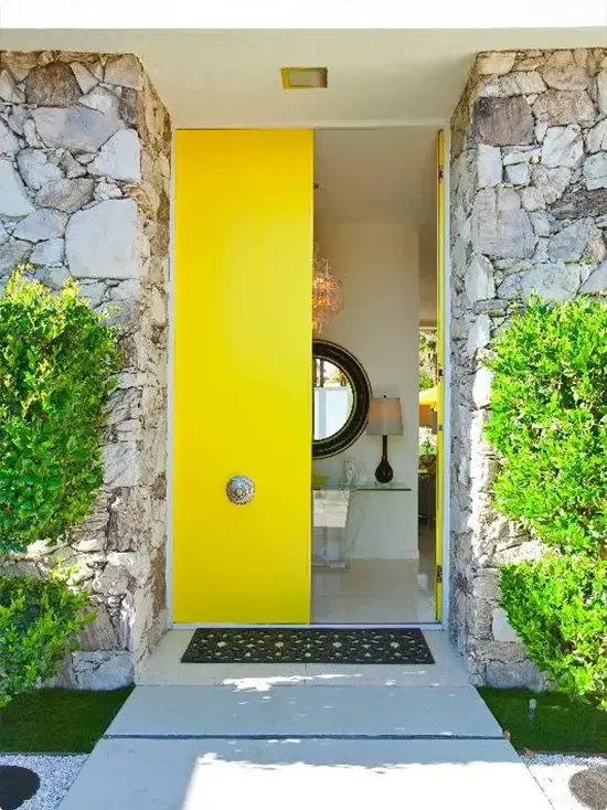 Sunshine Yellow Front Door with Stone Walls