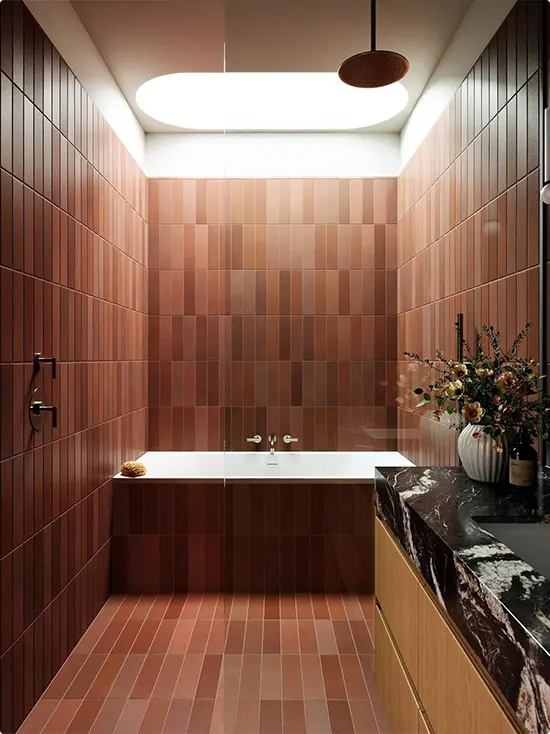 Terracotta Bathroom with a Skylight