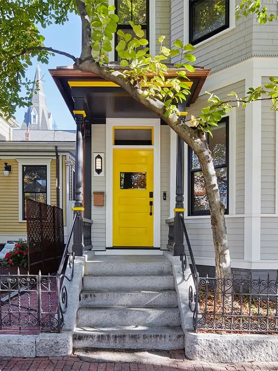 Victorian Home with a Yellow Front Door