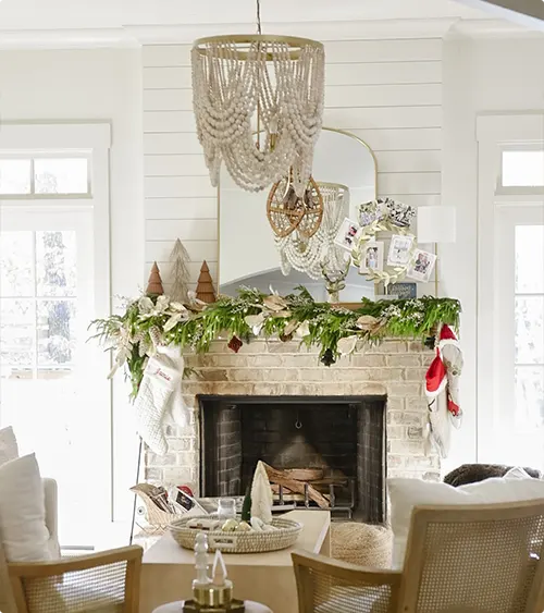 Whitewashed Farmhouse Fireplace with Greenery