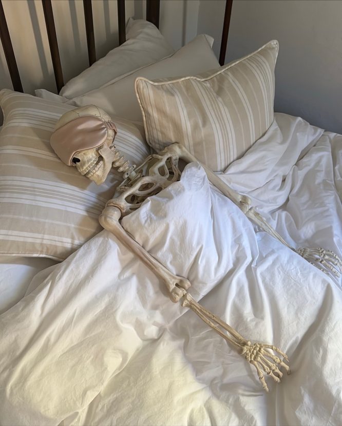 Sleeping Skeleton in Bed
