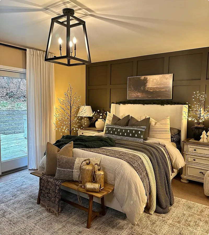 Woodland Christmas Bedroom with Greenery and Lighted Branches