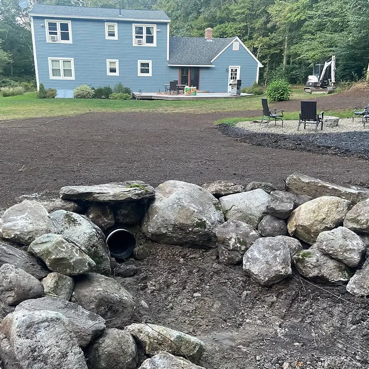 Backyard Boulder Wall With Culvert