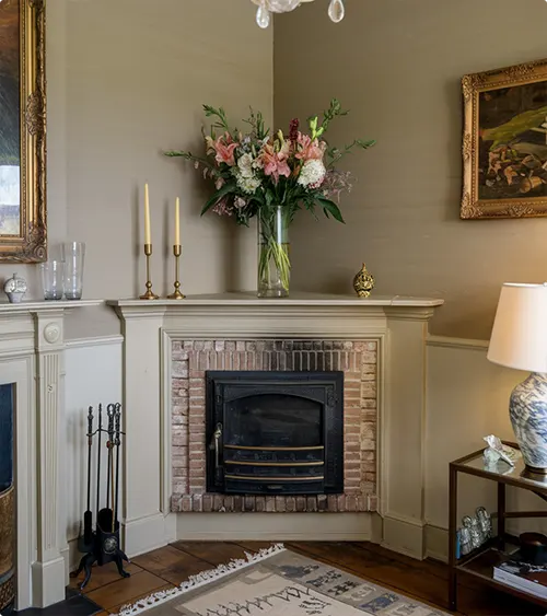 Brick Fireplace Insert with White Mantel