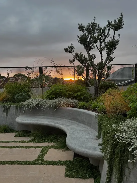 Garden corner concrete bench