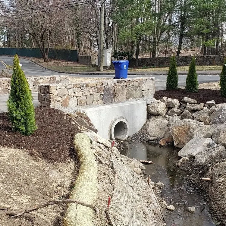 Stone Capped Arborvitae Culvert