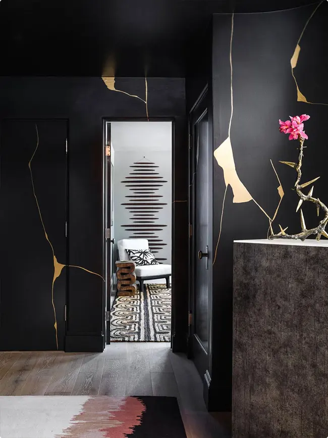 Gold Accents on Black Walls