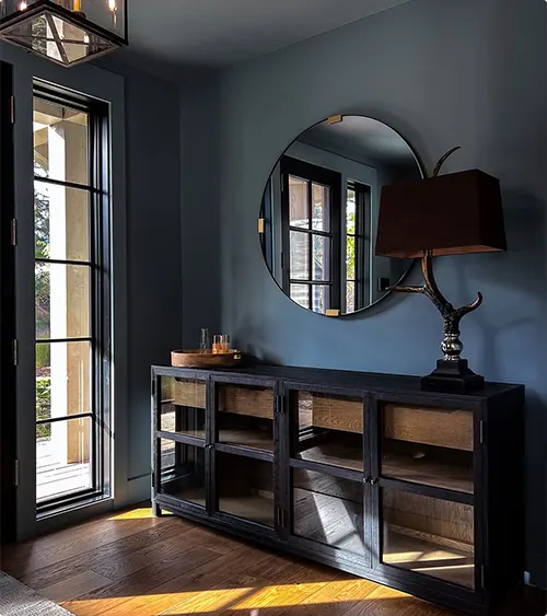 Glass Cabinet Doors in a Blue Entryway
