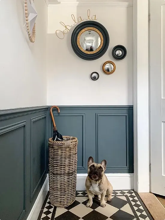 Teal Wainscoting with Round Mirrors