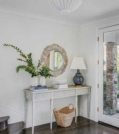 Woven Basket and Sunburst Mirror