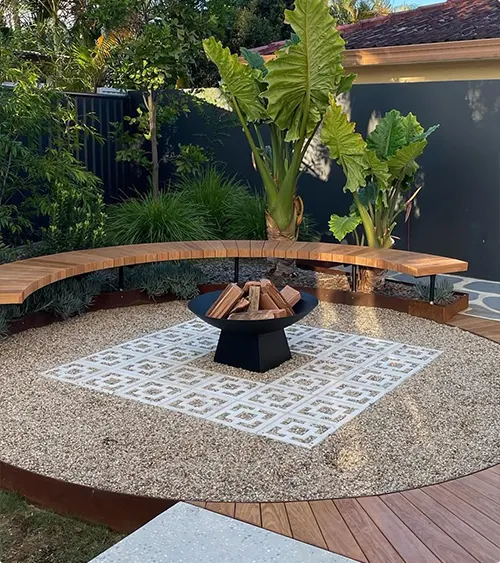 Curved Bench surrounded by Tropical Plants