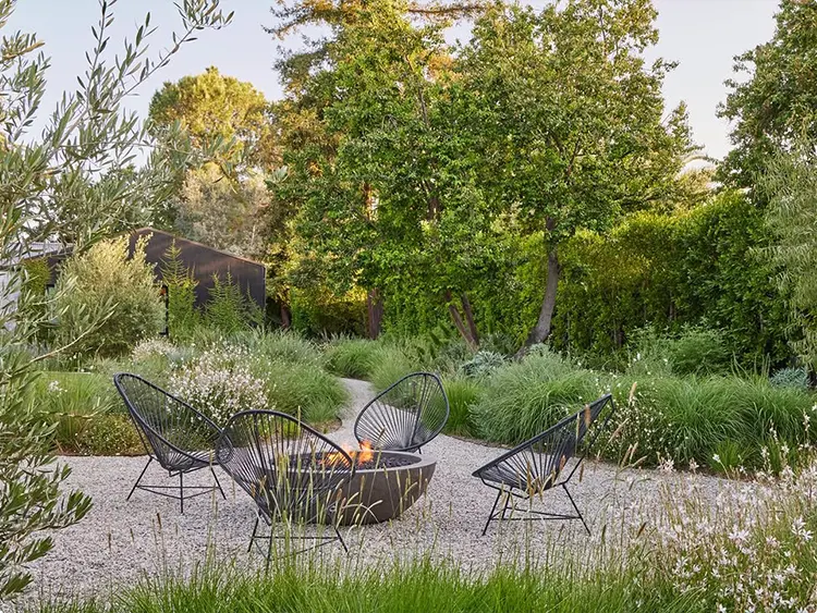 Modern Wire Chairs in a Gravel Garden