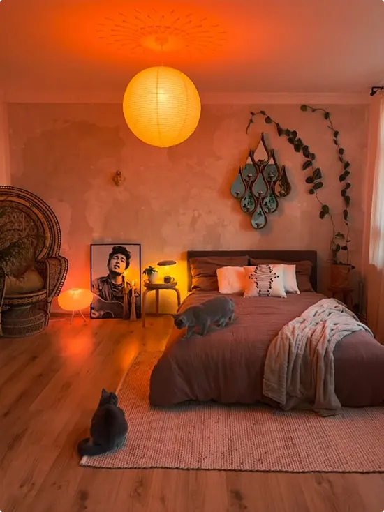 Boho Bedroom with Vintage Poster and Paper Lantern